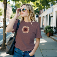 Load image into Gallery viewer, A blonde woman walking on a city street wearing the No. 28 The Evolution Premium Luxury Tee in Heather Mauve.