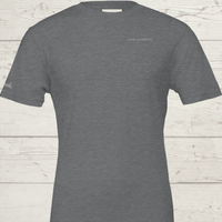 Load image into Gallery viewer, Women's premium sueded cotton graphic tee in Light Heather Grey. 'The Exhale' quiet luxury design featuring subtle typography for everyday comfort.