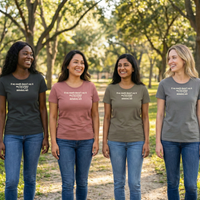 Load image into Gallery viewer, Four diverse women standing in a sunlit outdoor setting wearing 'Resonance' sueded cotton graphic tees. Mindful apparel reflecting personal growth and inner work.