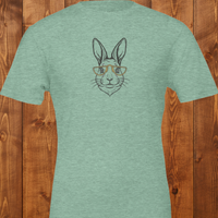 Load image into Gallery viewer, Flat lay of a heather green premium ring-spun cotton luxury tee featuring a crisp, minimalist rabbit line-art design.