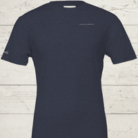 Load image into Gallery viewer, Women's premium sueded cotton graphic tee in Navy. Minimalist 'The Exhale' wellness design. Quiet luxury apparel tailored for inner resilience.