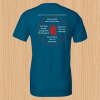 Load image into Gallery viewer, Savage With My Standards shirt in Deep Teal — back flat lay showing anatomical heart graphic and manifesto circle, premium double-sided print