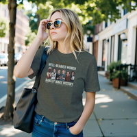 Load image into Gallery viewer, A young blonde woman wearing sunglasses walking down a city street, modeling the olive green No. 32 Well-Behaved Women t-shirt.