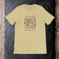 Load image into Gallery viewer, All Is Well shirt in Warm Cream — flat lay, front of shirt