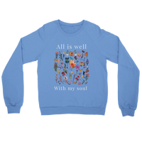 Load image into Gallery viewer, Carolina Blue All Is Well crewneck sweatshirt laid flat, showing the wildflower field with “All is well” above and “With my soul” below in off-white lettering.
