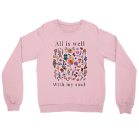 Load image into Gallery viewer, Pink All Is Well crewneck sweatshirt laid flat, showing the wildflower field with “All is well” above and “With my soul” below in charcoal lettering.
