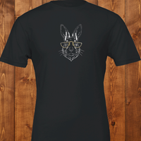 Load image into Gallery viewer, Flat lay of a true black premium ring-spun cotton luxury tee showcasing the high-contrast white rabbit line-art and gold geometric glasses.