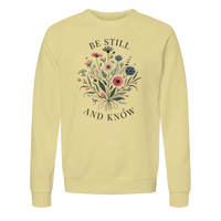 Load image into Gallery viewer, French Vanilla Be Still and Know crewneck sweatshirt laid flat, showing the wildflower bouquet with "Be Still" above and "And Know" below in charcoal lettering.
