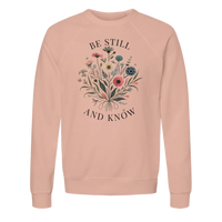 Load image into Gallery viewer, Peach Be Still and Know crewneck sweatshirt laid flat, showing the wildflower bouquet with "Be Still" above and "And Know" below in charcoal lettering.
