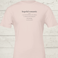 Load image into Gallery viewer, Women's premium sueded cotton graphic tee in soft Pale Pink. Minimalist 'Hopeful Romantic' design. Part of the Vital Threads wellness collection.