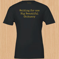 Load image into Gallery viewer, Flat lay of the vintage black premium graphic tee highlighting the heavy, ultra-soft Airlume cotton weave and striking golden-yellow typographical text block.