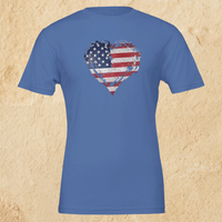 Load image into Gallery viewer, Flat lay of the Heather Columbia Blue Deep Roots, Steady Heart shirt on a tan background, showing the full distressed American flag heart graphic across the chest.