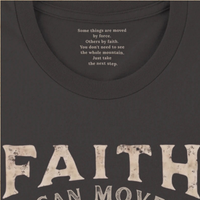 Load image into Gallery viewer, Close-up of the inner collar on the Vintage Black Faith can Move Mountains shirt, showing the hidden message: Some things are moved by force. Others by faith. You don't need to see the whole mountain. Just take the next step.