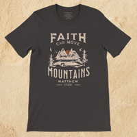 Load image into Gallery viewer, Flat lay of the Vintage Black Faith can Move Mountains shirt on a tan background, showing the full front mountain graphic.