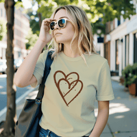 Load image into Gallery viewer, Vital Threads Wear Your Intention t-shirt with brown interlocking hearts graphic on butter yellow fabric.
