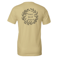 Load image into Gallery viewer, Grace, Joy &amp; Peace shirt in Soft Cream, back view showing the botanical wreath design.