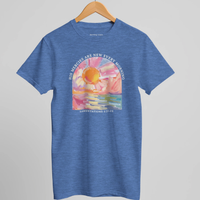 Load image into Gallery viewer, Heather Columbia Blue His Mercies Are New Every Morning shirt on a wooden hanger against a light studio backdrop, front graphic and collar reveal visible.