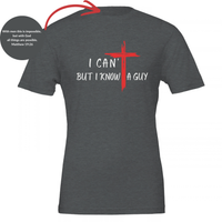 Load image into Gallery viewer, Dark Grey Heather I Can't But I Know A Guy t-shirt, white hand-brushed lettering, I CAN' over BUT I KNOW A GUY, with a red brushstroke cross that forms the T in CAN'T and stands between KNOW and A GUY, with the Matthew 19:26 collar verse shown inset.
