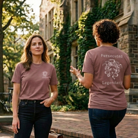 Load image into Gallery viewer, Two women wearing Heather Mauve Medusa Vilified shirt showing front and back graphic on campus