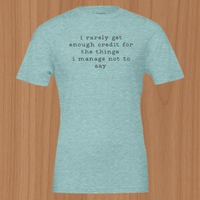 Load image into Gallery viewer, Flat lay mockup of the No 29 Unspoken Word premium sueded cotton tee in heather teal.