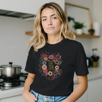 Load image into Gallery viewer, A lifestyle shot of the No. 33 The Calling premium luxury tee in black worn in a bright, modern kitchen, emphasizing the garment as an elevated, comfortable everyday uniform.