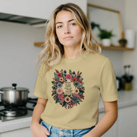 Load image into Gallery viewer, A lifestyle photograph of the No. 33 The Calling premium luxury tee in cream styled in a modern kitchen setting, blending intentional aesthetic with premium everyday comfort.