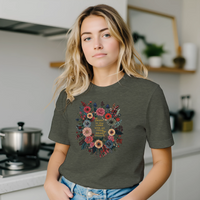 Load image into Gallery viewer, A relatable home lifestyle image featuring the No. 33 The Calling premium luxury tee in military green, connecting wearable natural history with a curated home aesthetic.