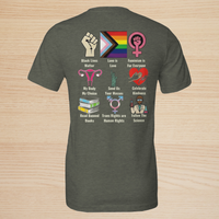 Load image into Gallery viewer, Flat lay back view of the No. 34 Human Rights premium luxury tee in leaf green, showcasing the vibrant 3x3 line-art graphic on a beautifully textured, ring-spun cotton base.