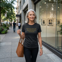 Load image into Gallery viewer, Someone with silver hair walking past a contemporary art gallery wearing the No. 36 Big Beautiful Obituary shirt in Black — unapologetic premium quiet luxury.