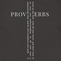 Load image into Gallery viewer, Close-up of the Proverbs 3:5-6 back graphic - PROVERBS in serif capitals with "Trust in the Lord with all your heart, and don't lean on your own understanding" set vertically through the lettering to form a cross, 3:5-6 beneath.
