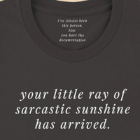 Load image into Gallery viewer, Inner back collar of the vintage black tee reading "I've always been this person. Now you have the documentation." — Vital Threads hidden manifesto detail.