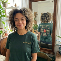 Load image into Gallery viewer, Savage With My Standards shirt in Forest — woman taking mirror selfie with back graphic visible in reflection, side-seamed premium tee