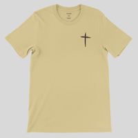 Load image into Gallery viewer, Flat lay of the Soft Cream Trust In Him shirt, showing the hand-drawn cross graphic with "Trust In Him" on the chest.