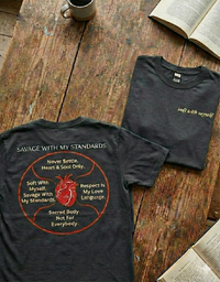 Load image into Gallery viewer, Flat lay featuring two Dark Grey Heather No. 10 The Manifesto premium luxury tees, displaying the front typography and back anatomical heart design.