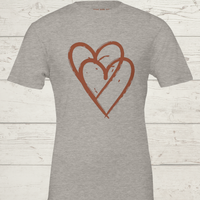 Load image into Gallery viewer, Flat lay of the Heather Dust grey No. 13 interlocking hearts premium luxury tee.