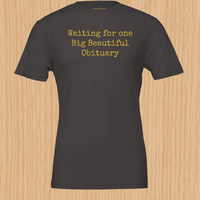 Load image into Gallery viewer, Front detail of the No. 36 Big Beautiful Obituary shirt in Vintage Black, highlighting the high-contrast golden-yellow typewriter print on premium dark canvas.
