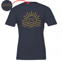 Load image into Gallery viewer, Heather Midnight Navy You Are The Light shirt, flat front view: a half sun rising over water with You Are The Light in serif inside the sun, and Matthew 5:14 below.
