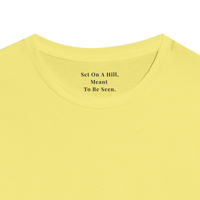 Load image into Gallery viewer, Close-up of the hidden collar message inside the Yellow You Are The Light shirt, reading Set On A Hill, Meant To Be Seen.
